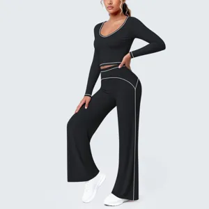 Schwarzes Langarm Schlag Yoga Set mit Kontrastpaspelierung für Fitness, Laufen und Sport.
