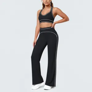 Set sportivo da donna reggiseno sportivo con piping a contrasto e pantaloni yoga a zampa