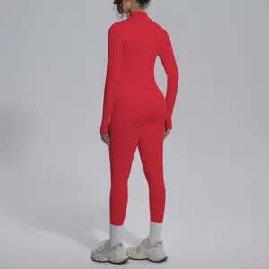 Set completo sportivo maniche lunghe e leggings yoga tinta unita senza cuciture dettaglio retro.