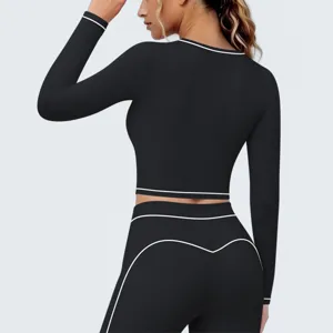 Stijlvolle sportieve crop top met lange mouwen en contrastbies voor fitness en yoga