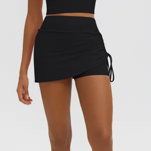 Black athletic yoga skort with side ruching drawstring high waist fitness activewear shorts.