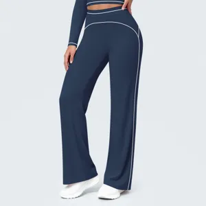 Navy blue high-waisted wide-leg yoga pants with white contrast piping activewear detail.
