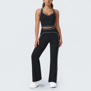 Femme ensemble de yoga sportif deux pièces noir passepoil contraste crop top pantalon évasé