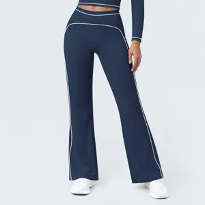 Women's high waist navy blue athletic flare pants with contrast white piping details.