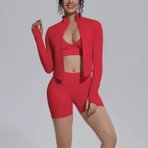 Seamless solid red sports three-piece set detail showing jacket, bra and high elastic shorts.