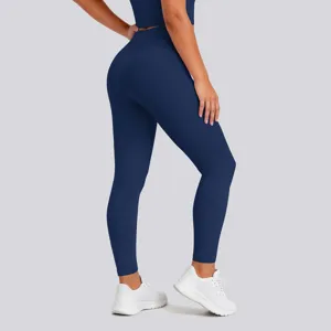Detail view of high-waisted navy blue yoga leggings, offering compression and butt lifting.