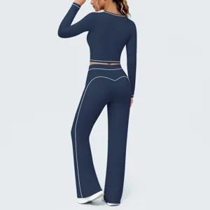 Dunkelblaues Langarm Crop Top und Schlag Yoga Hose Sportbekleidung Set für Damen.