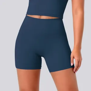 High-waist athletic yoga shorts in dark blue, breathable seamless activewear detail view.