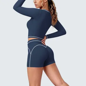 Detail view of the contrast color long sleeve shorts yoga set, high elastic fitness activewear.
