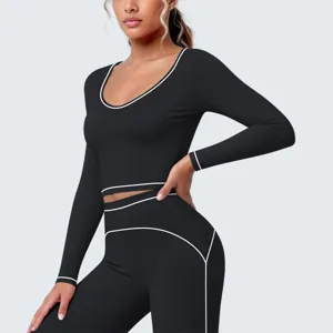 Schwarzes langärmliges Sport-Crop-Top und Leggings Set für Yoga, Fitness und Lauftraining.