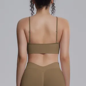 Seamless back view of a khaki stretch sports bra and yoga leggings for fitness and running.