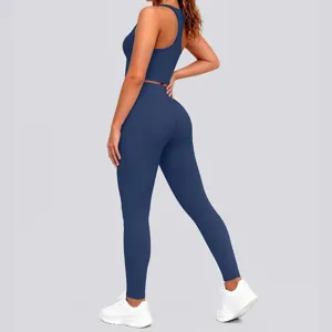 Solid navy activewear set, crop sports top and high-waisted leggings for fitness.