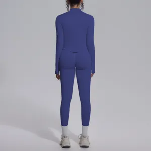 Set da yoga sportivo a maniche lunghe tinta unita senza cuciture e leggings per fitness da donna