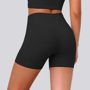High-waist black yoga shorts detail view, featuring high stretch and breathable nude feel fabric.