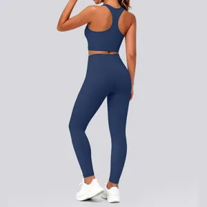 Solid dark blue racerback sports bra and high-waisted yoga leggings set for women fitness wear.