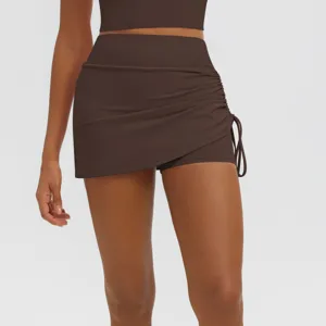 High waist ruched fitness yoga skort activewear detailed view in solid brown color.