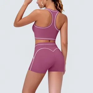 Back view of a seamless fitness yoga set with contrast piping sports bra and shorts.