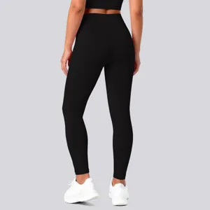 Back view of high waist solid black yoga leggings with butt lifting design for fitness workouts.