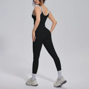 Detailed back view of the black contrast ribbed yoga tank top and high elastic fitness leggings.