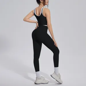 Detailed view of women's black and white contrast ribbed yoga set, perfect for fitness.