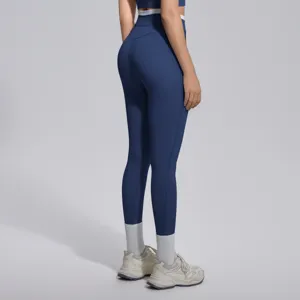 Vue détaillée des leggings de yoga bleus à taille haute montrant la coupe et les coutures.