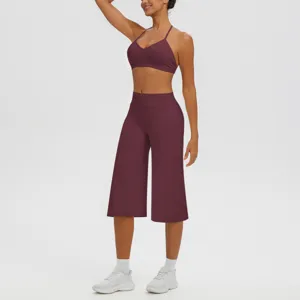 Ensemble soutien-gorge de sport dos-nu et pantalon de yoga taille haute pour femmes.