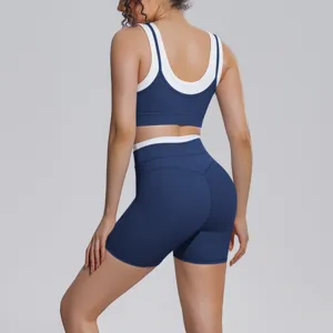 Back detail of two-piece sports yoga set, color-block activewear active crop top and shorts.