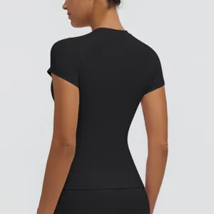 Detail view of a black slim-fit short sleeve yoga top, perfect for fitness and running.