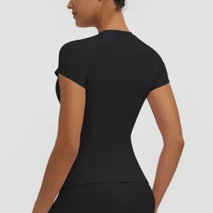 Detailed back view of the black short sleeve fitness top highlighting premium stretch fabric.