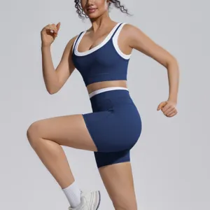 Detailed view of the blue colorblock athletic yoga set, highlighting the supportive sports bra.