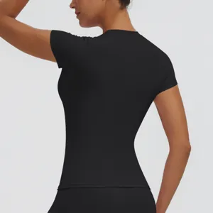 Women's short sleeve slim fit sports top for yoga, running, fitness and athletic workouts.