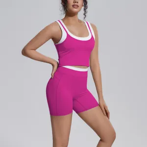Detailed view of the contrast color yoga set, featuring a crop top and matching shorts.