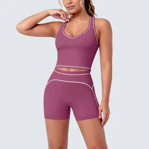 Detailed view of women activewear set, contrast piping racerback bra and shorts.