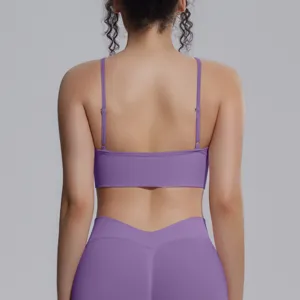 Detail view of back showing seamless purple yoga bra and high waist leggings for fitness.