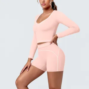 Pink long sleeve crop top shorts workout yoga set for women fitness running gym activewear.