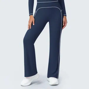 Deep blue high waist contrast piping yoga flared pants detail view, activewear fitness trousers.
