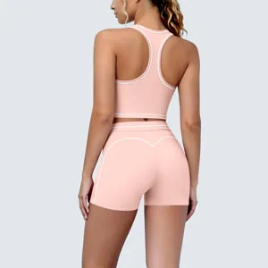 Pink color-blocked racerback sports bra and shorts yoga set, back detail view for fitness.