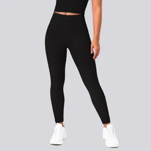 High waist black yoga leggings detail view, featuring high elasticity and supportive fit.