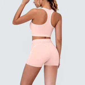 Back details of pink contrast piping sports bra and fitness shorts set, comfortable workout wear.