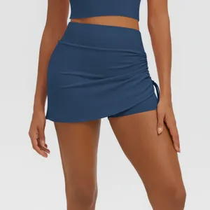 High waisted gathered sports skort detail, breathable and stretchy fabric for yoga fitness.