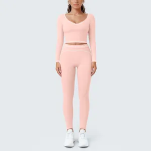 Pink long sleeve crop top and high waist leggings yoga set for women gym workout activewear.