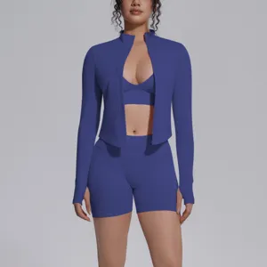 Seamless solid color three-piece yoga activewear set featuring jacket, bra and shorts for fitness.
