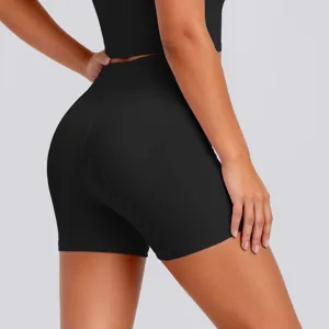 Close-up detail view of black high-waisted yoga shorts, breathable athletic fitness wear.