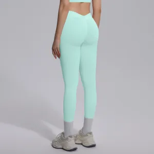 Back view detail of mint green seamless high waist yoga leggings showcasing the flattering fit.