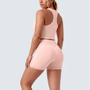 Back detail of pink activewear set with white piping, showcasing racerback and contoured fit.