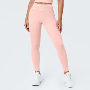 Pantalones de yoga rosa de tiro alto con detalles de costuras blancas para fitness.