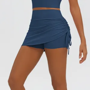 High-waisted athletic skort with ruched drawstring design, perfect for yoga, running, and fitness.