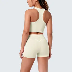 Women's athletic two-piece yoga set with racerback sports bra and high-waisted fitness shorts.