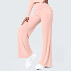 Pink high waist wide leg yoga pants set detail, contrast piping fitness activewear outfit.