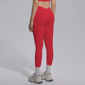 Red seamless high-waist fitness yoga leggings detail view for women running gym sportswear workout.